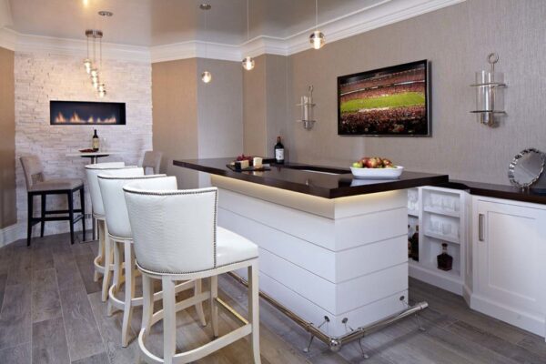 Black Absolute Countertops with Cleft stone fireplace