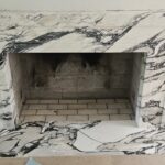 Calacatta Corchia Marble Custom Fireplace