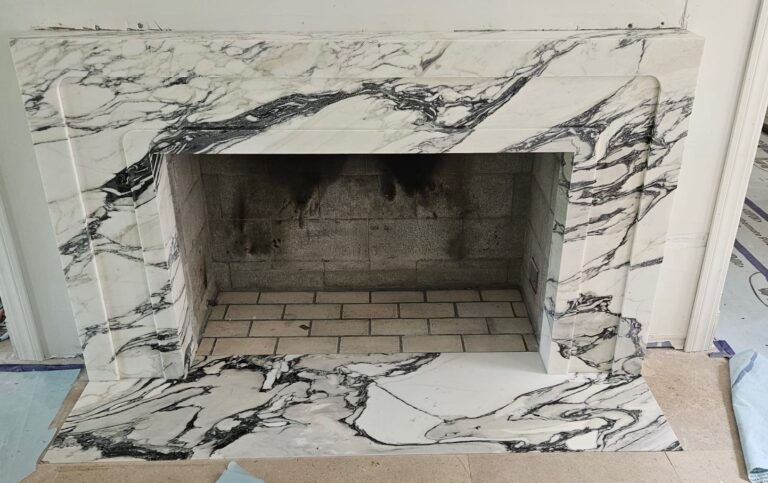 Calacatta Corchia Marble Custom Fireplace