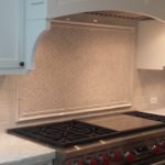 handmade-ceramic-backsplash-with-marble-countertops