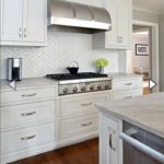 handmade-white-ceramic-herringbone-backsplash