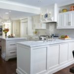 white-cararra-countertops-with-white-cararra-brick-mosaic-backsplash